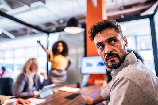 Man annoyed while female coworker yells at him - Whistleblower Protection